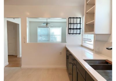 Freshly remodeled, this home is spacious and light filled. In addition to two bedrooms, it has a separate family room which is perfect for use as a home office. The two car garage is clean and open, ready for use as an exercise space or a large office.