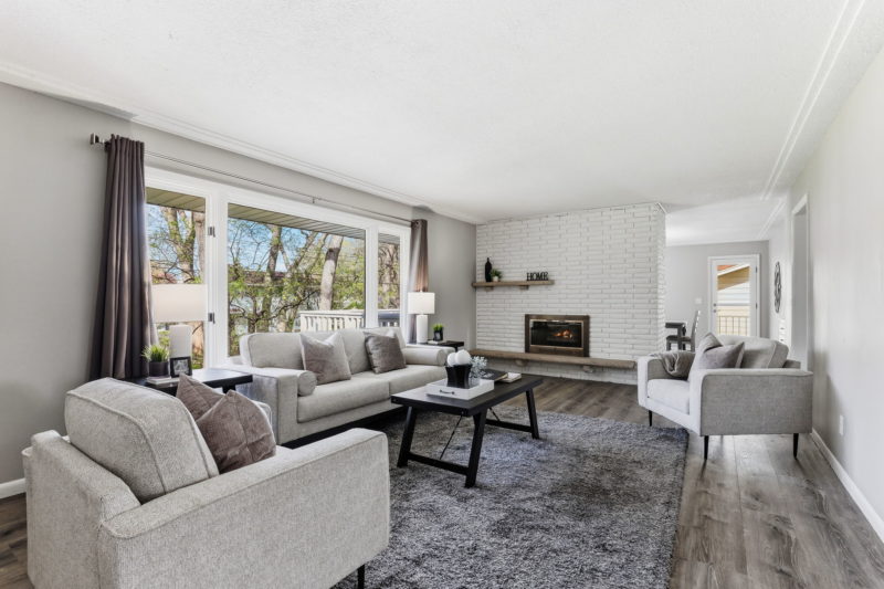 Spectacular move-in ready, mid-century rambler sitting pretty on a quiet, winding street, lined with gorgeous mature trees.