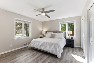 Spectacular move-in ready, mid-century rambler sitting pretty on a quiet, winding street, lined with gorgeous mature trees.