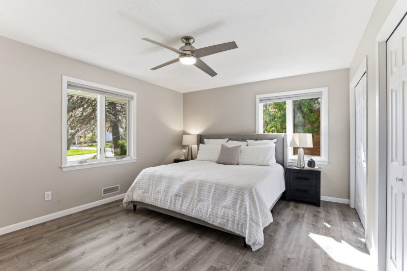 Spectacular move-in ready, mid-century rambler sitting pretty on a quiet, winding street, lined with gorgeous mature trees.