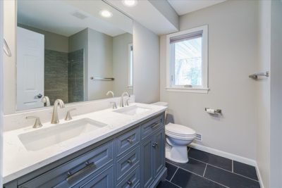 Spectacular move-in ready, mid-century rambler sitting pretty on a quiet, winding street, lined with gorgeous mature trees.