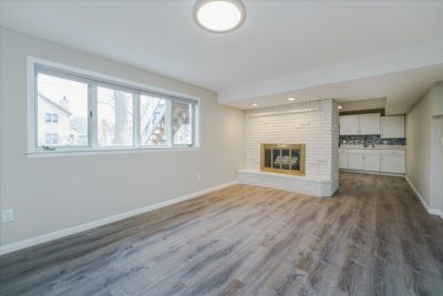 Spectacular move-in ready, mid-century rambler sitting pretty on a quiet, winding street, lined with gorgeous mature trees.