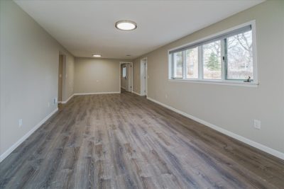 Spectacular move-in ready, mid-century rambler sitting pretty on a quiet, winding street, lined with gorgeous mature trees.
